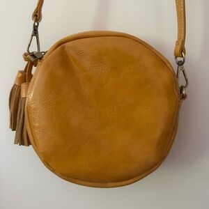 Anthropologie Round Purse with Leather Tassels